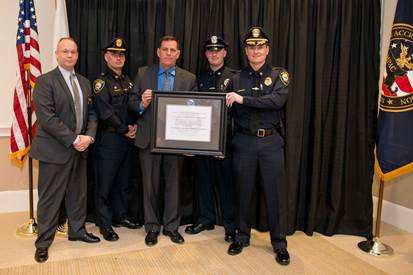 Certification award being presented to MPD by the MPAC.